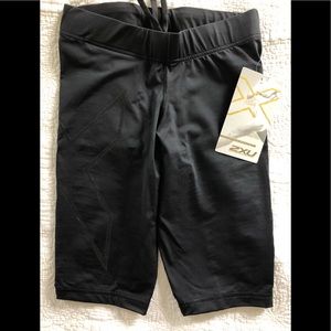 2XU compression shorts-mid thigh.